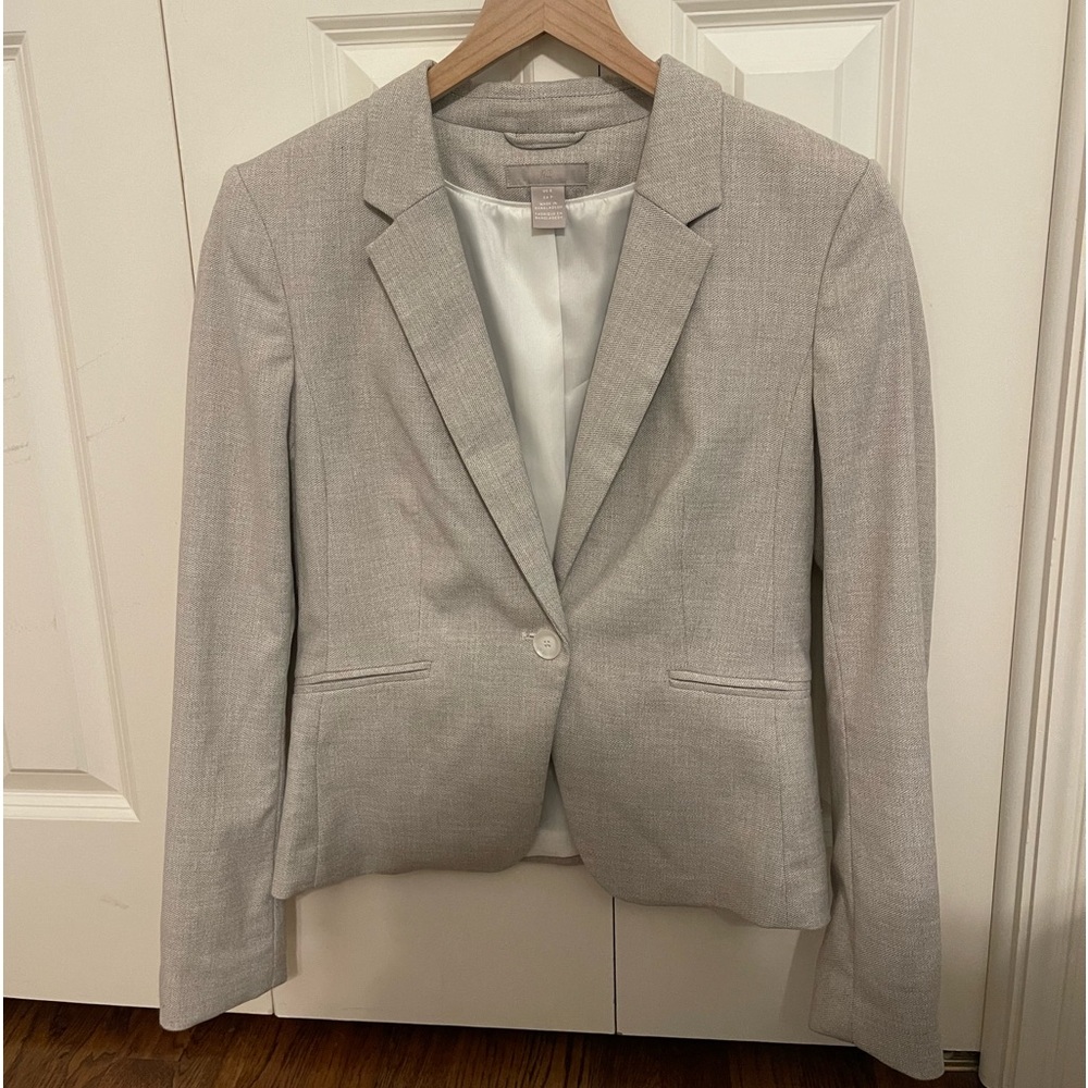 Tan matching pantsuit with blazer and slacks. Perfect condition.